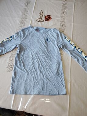 Jordan Light Blue Long Sleeve Tee with Sleeve Chevron Graphics